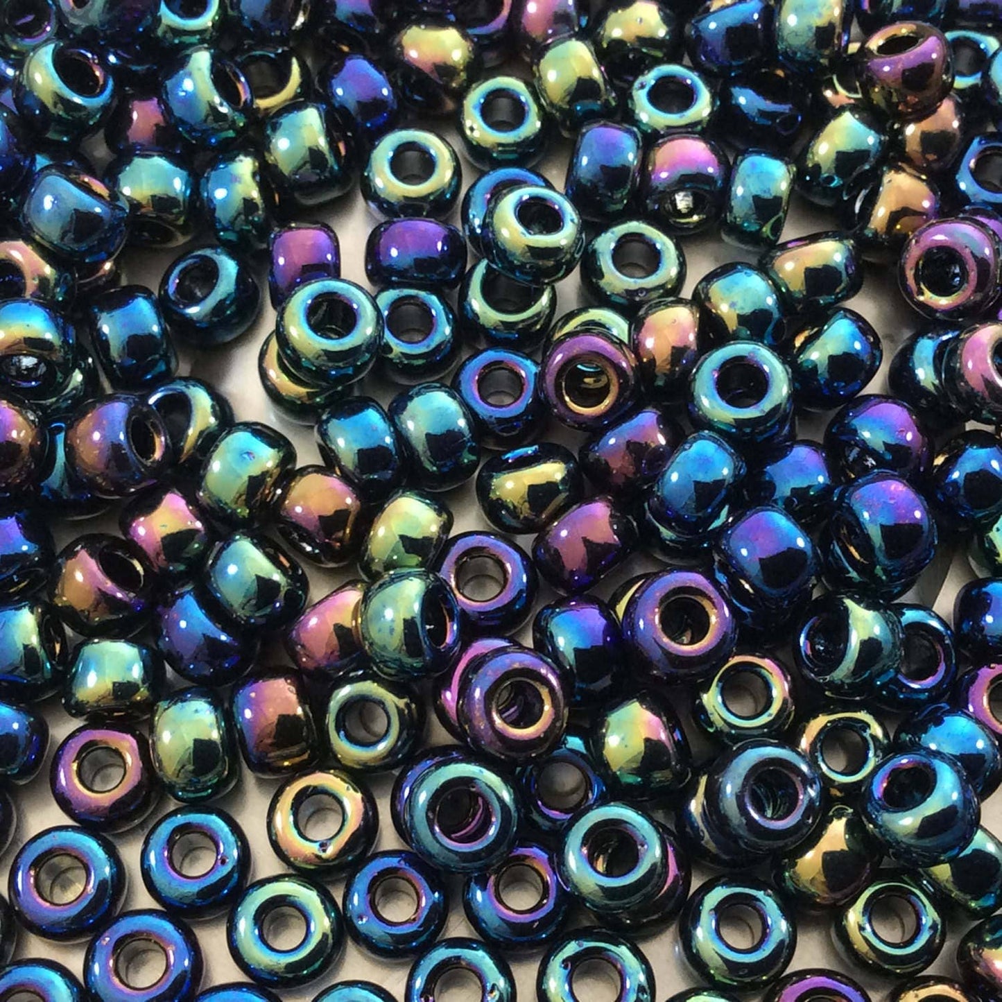 Size 6/0 Opaque Rainbow AB Finish Black Genuine Miyuki Glass Seed Beads - Sold by 20 Gram Tubes (Approx. 200 Beads per Tube) - (6-9401R)